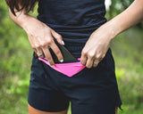 SPIbelt Running Belt for Women Men, Phone Holder for Running, Running Fanny Pack, Holder for Phone, Running Waist Pack, Adjustable Waist, [Fits All Phones]. Fuchsia with Black Zipper